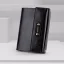 Čierny obal, sivé pozadie, zlatý detail – decentná výpoveď.